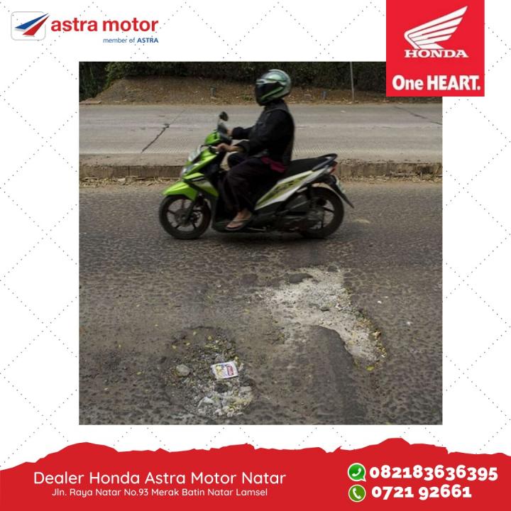 Naik Motor Di Jalanan Berlubang Dan Rusak, Ini Caranya